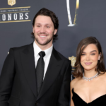 Minimalist editorial illustration of Josh Allen Hailee Steinfeld relationship news featuring a glowing football stadium, NFL play diagram, film award icon, music waveform, and heart connection symbol on a dark navy and gold background.