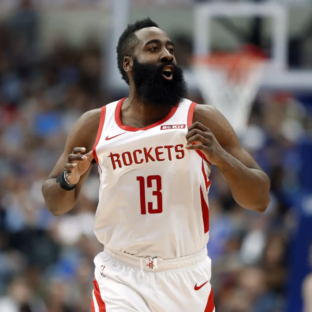 James Harden no beard article image showing the NBA superstar playing for the Houston Rockets, wearing jersey number 13 with his iconic full beard during a basketball game.